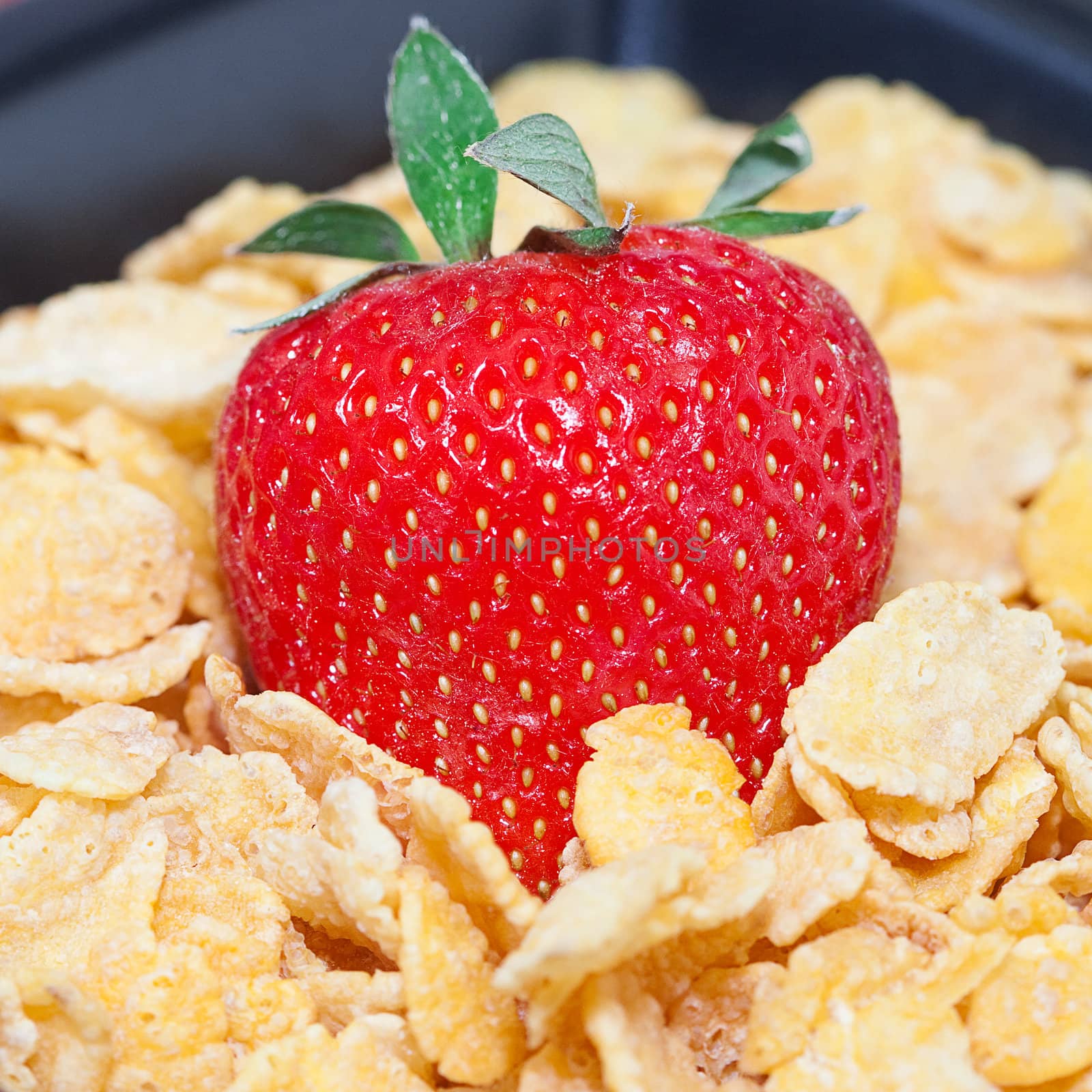 strawberry and flakes in a bowl 