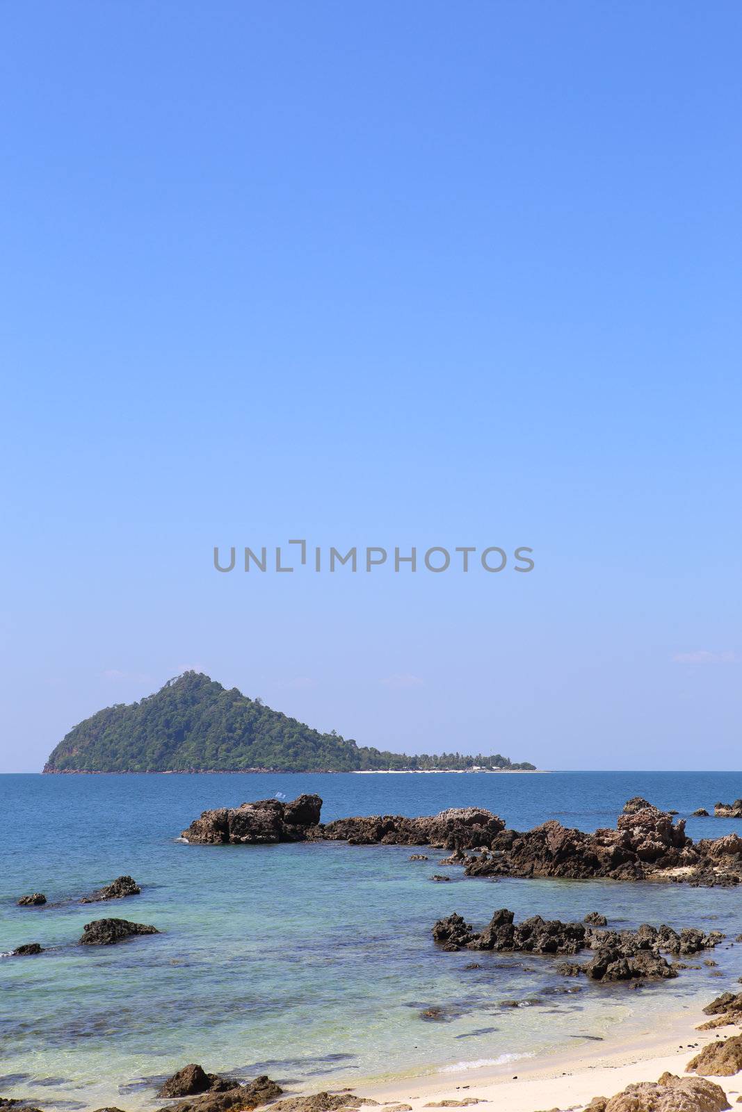 beach with rocks and blue sky,Thailand