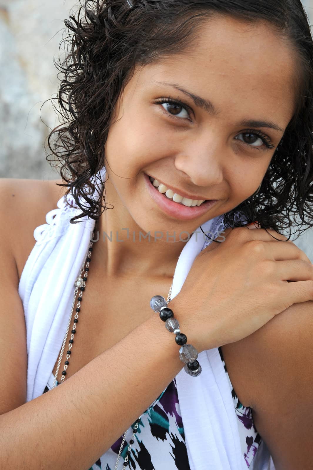 African American female beauty posing outside.