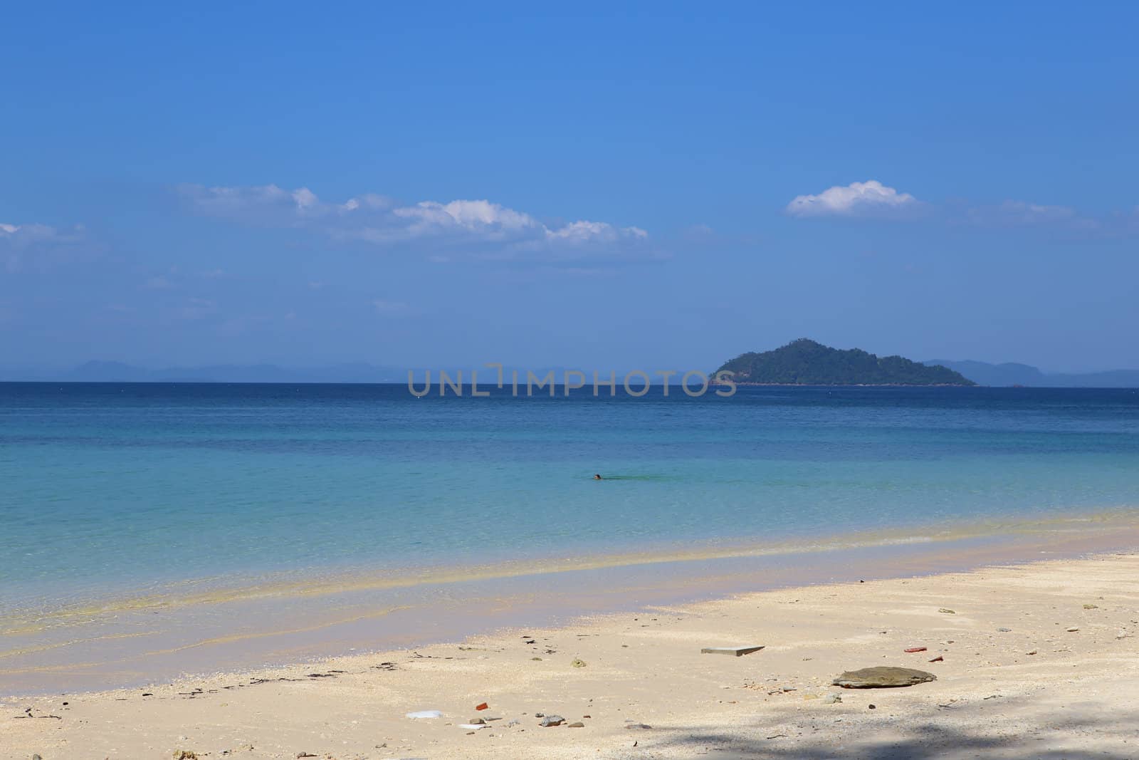Beautiful white sand beach on island with crystal clear sea, Andaman sea, Thailand