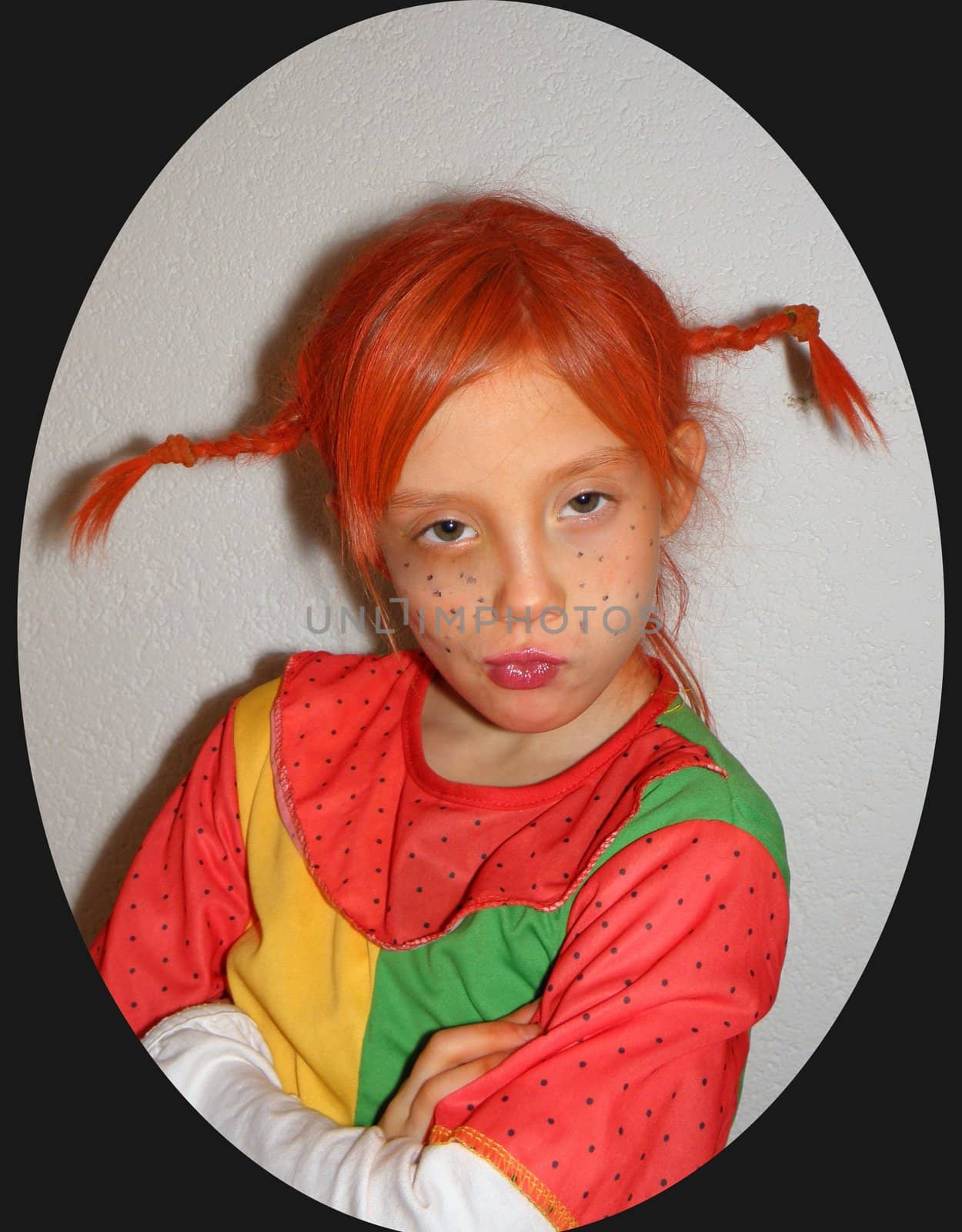 Photo of a girl to the children's Carnival, disguised as Pipi Longstocking.