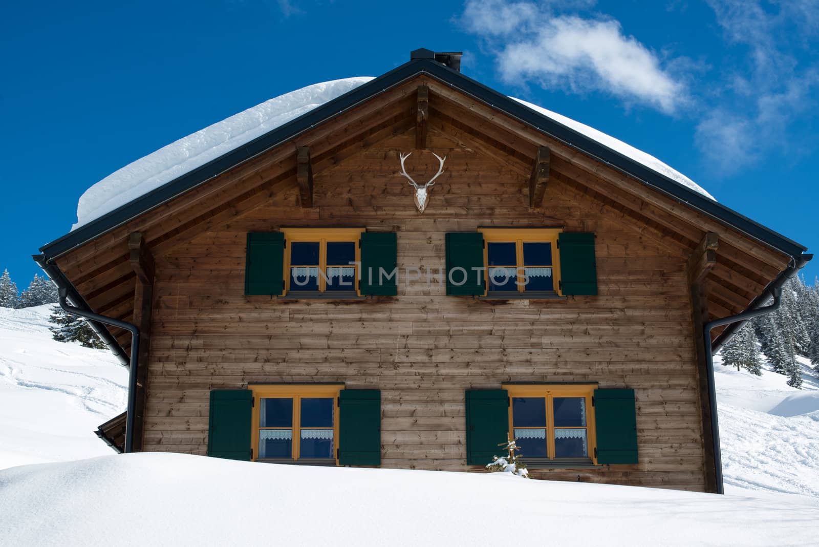 Beautiful skiing hut in a valley of Montafon, photo taken from public skiing piste