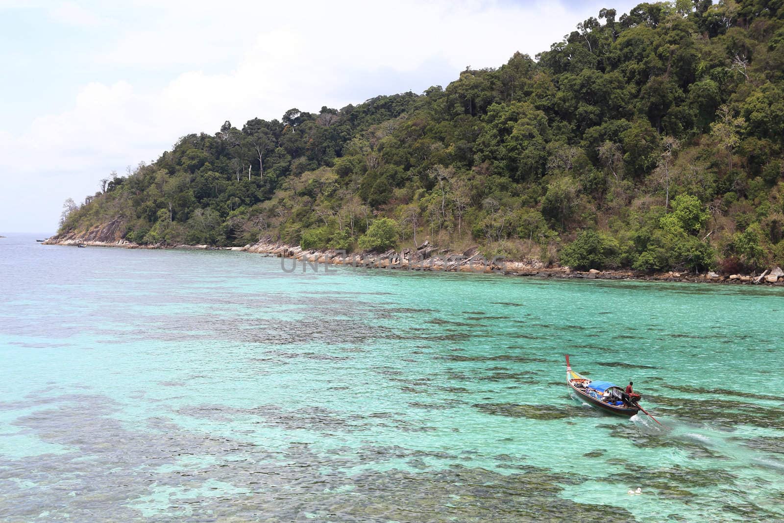 Traditional Thai longtail boat at the beach