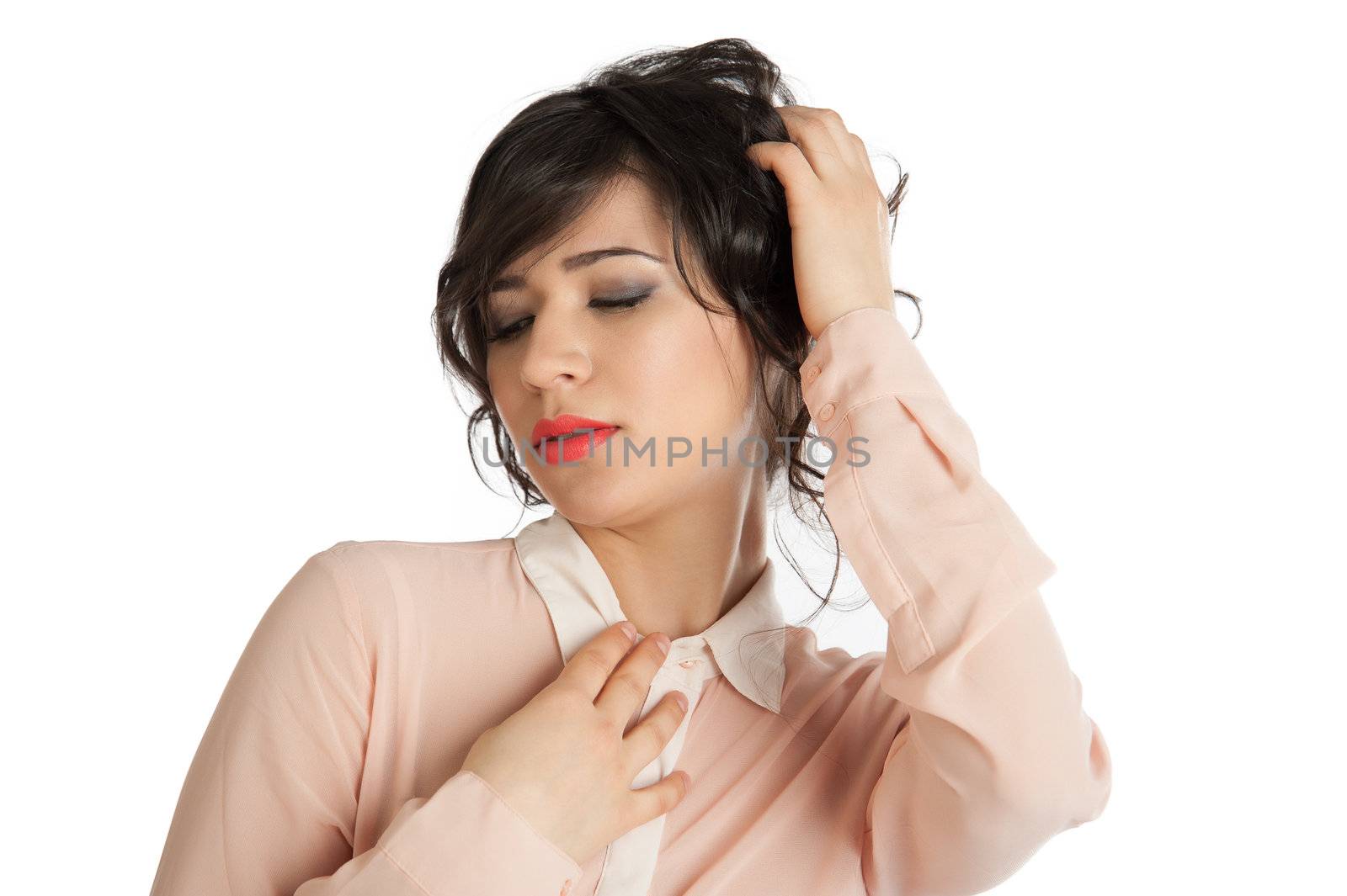 Portrait of a woman in a pink blouse on a white background isolated