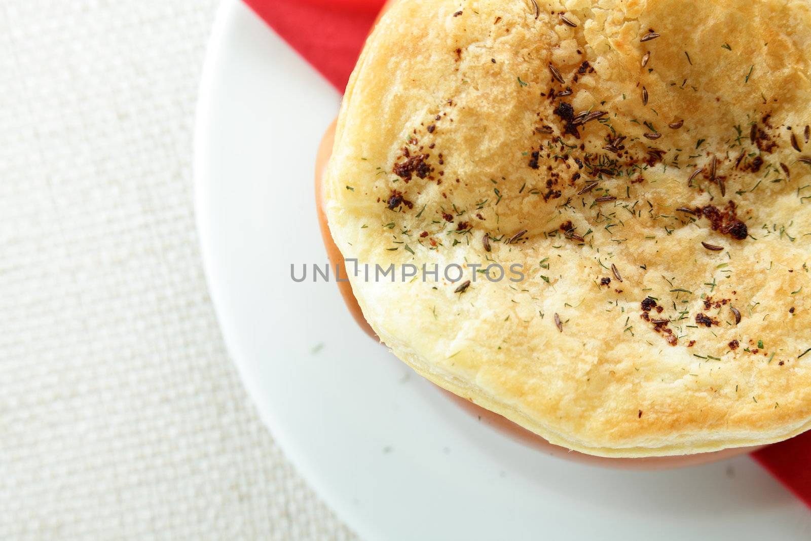 pancake on brown pot and bright background