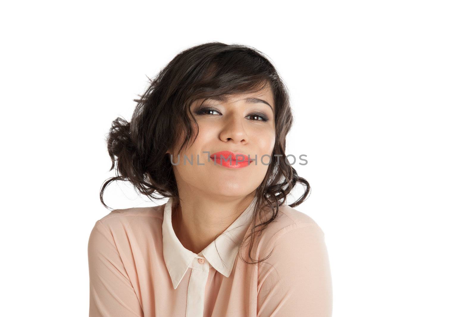 Portrait of a woman in a pink blouse on a white background isolated