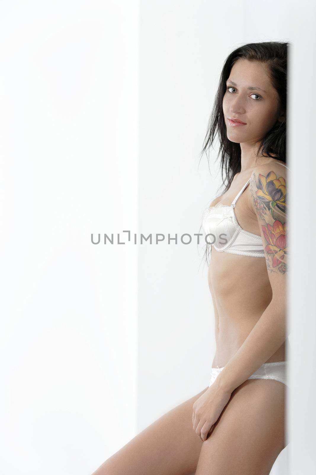 Beautiful woman in underwear by studiofi