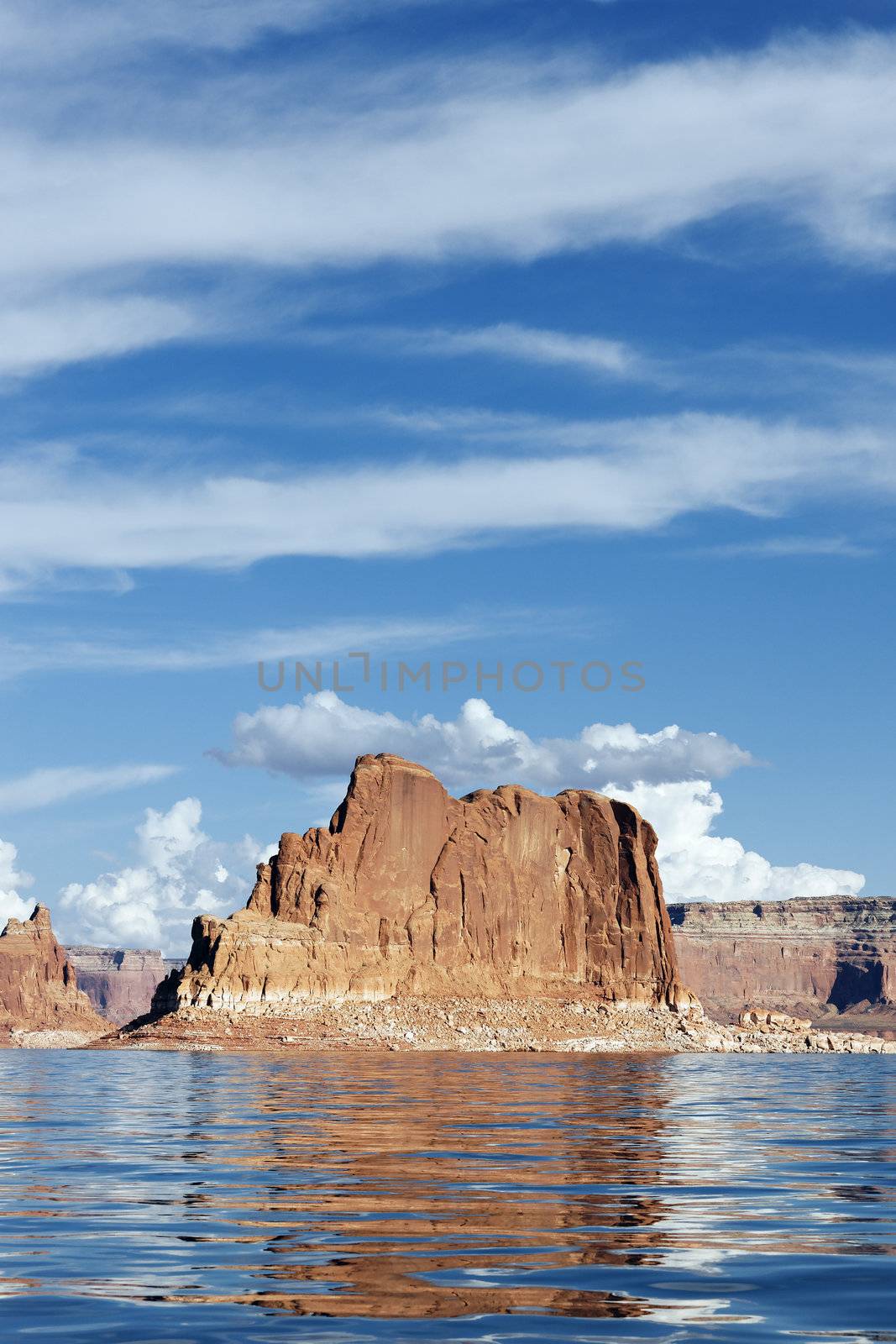 cliffs reflected in the smooth water of the lake Powell