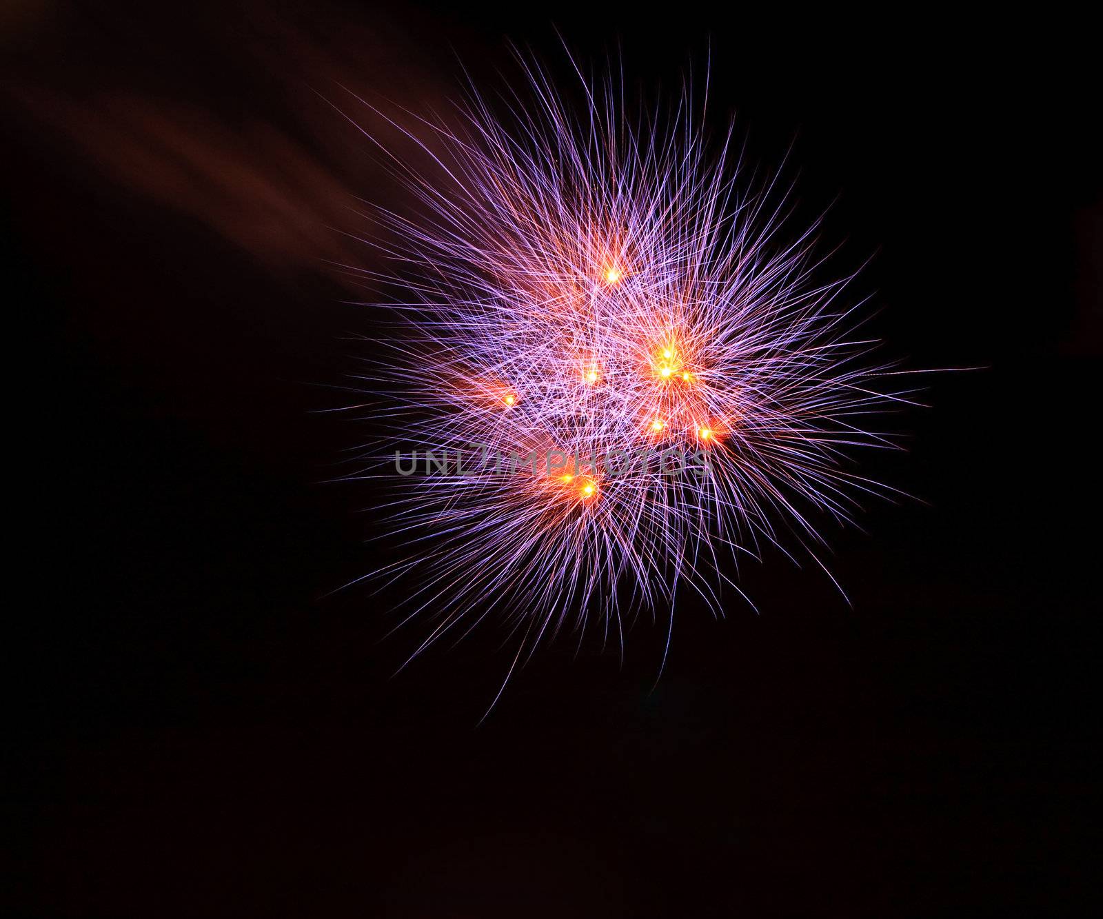 Orange and Violet  Fireworks on Dark Sky