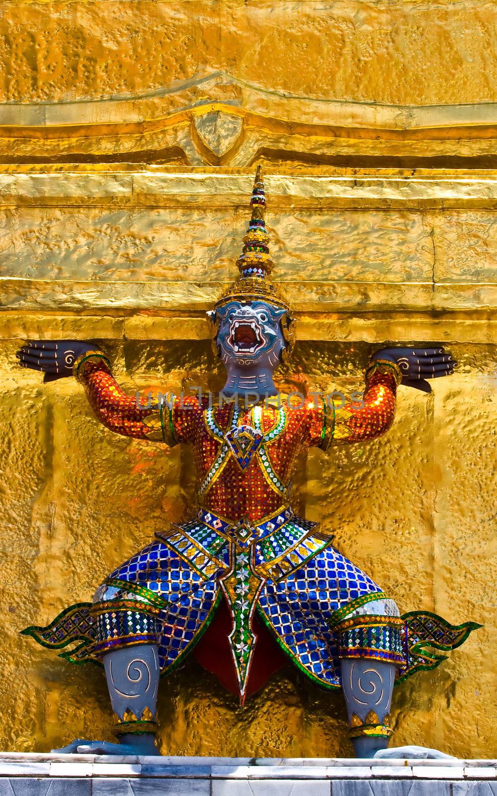 Guardian statue (yak) at the temple Wat phra kaew in the Grand palace area, one of the major tourism attractions in Bangkok, Thailand