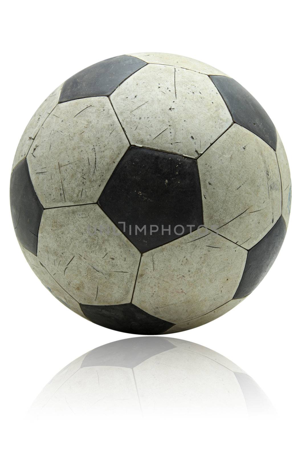 grunge soccer football with its reflection on white