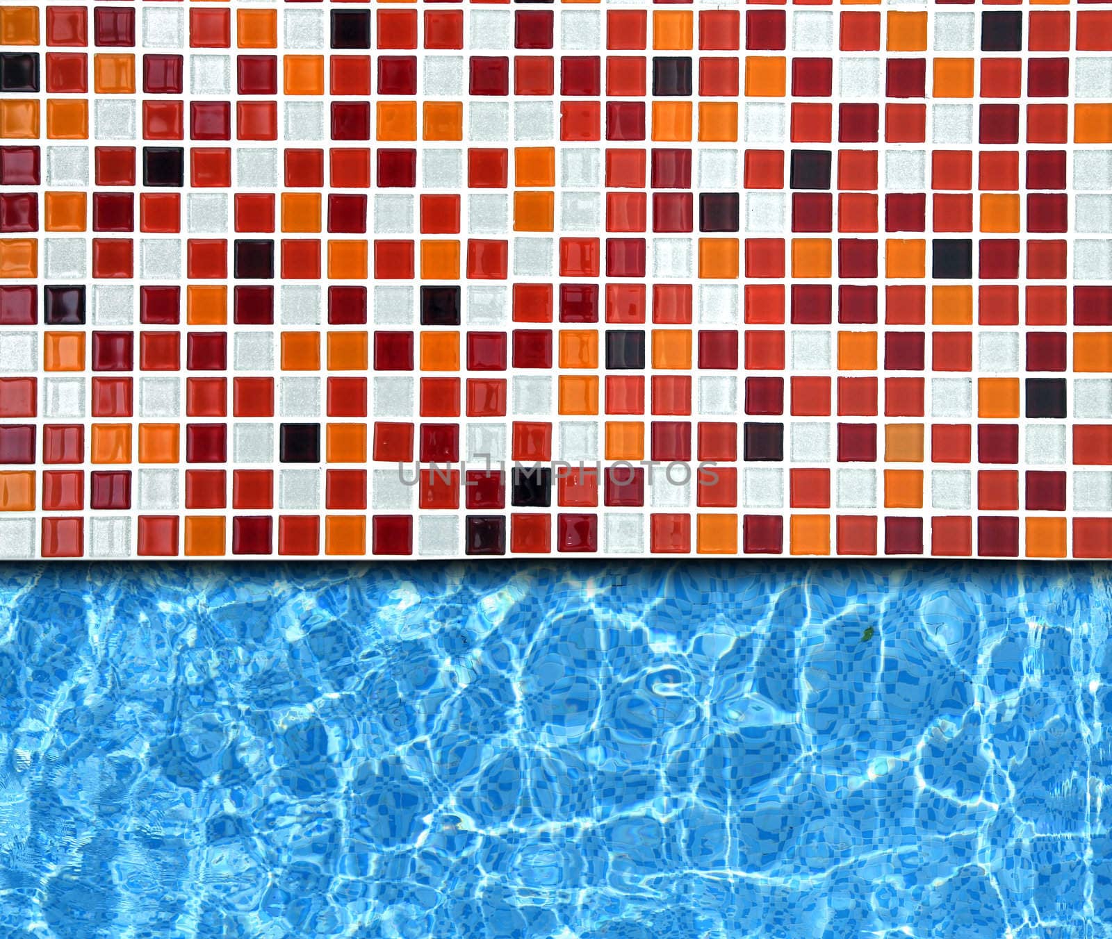 red mosaic pavement with pool background
