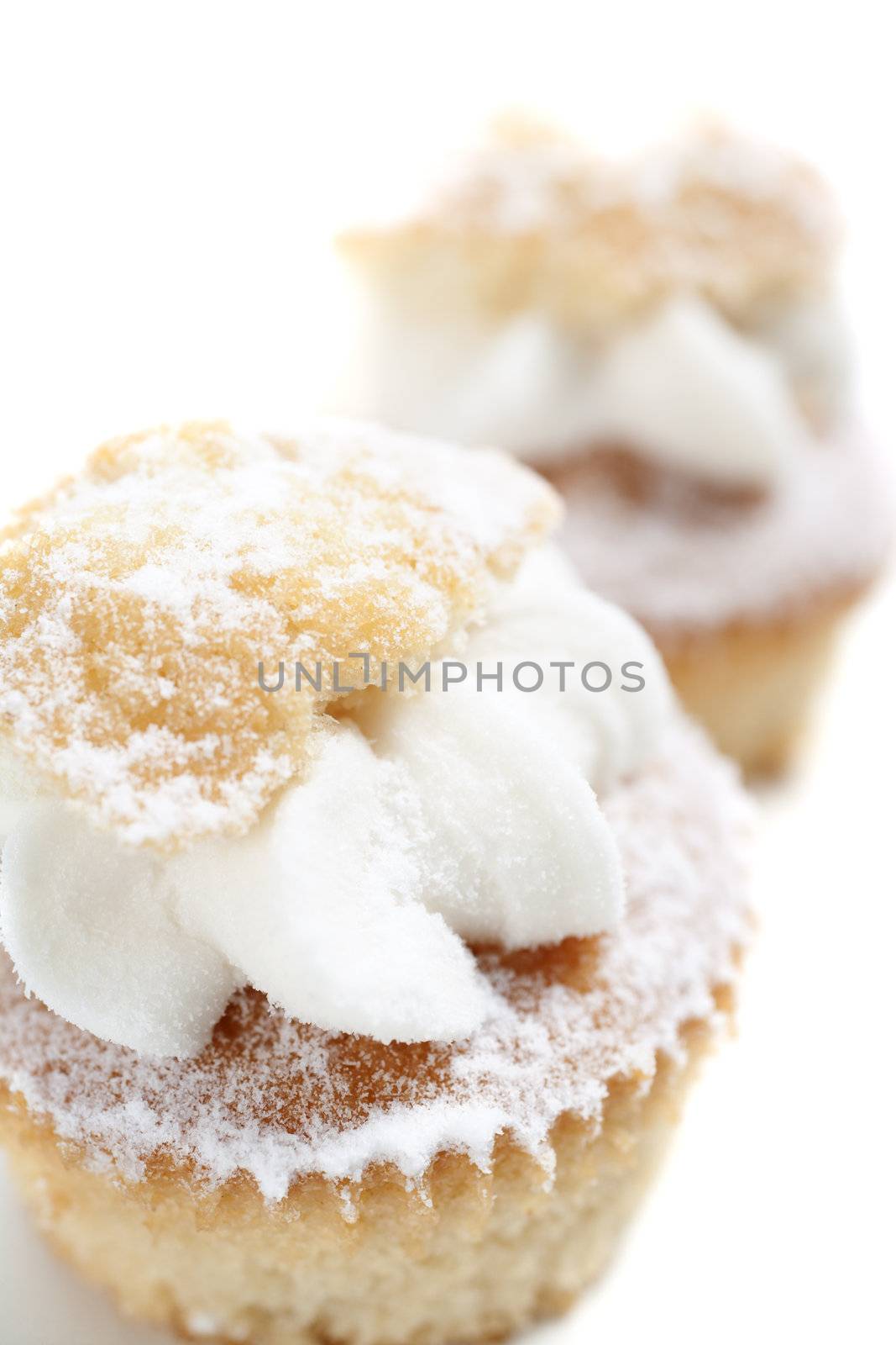 Freshly baked cup cakes with cream filling
