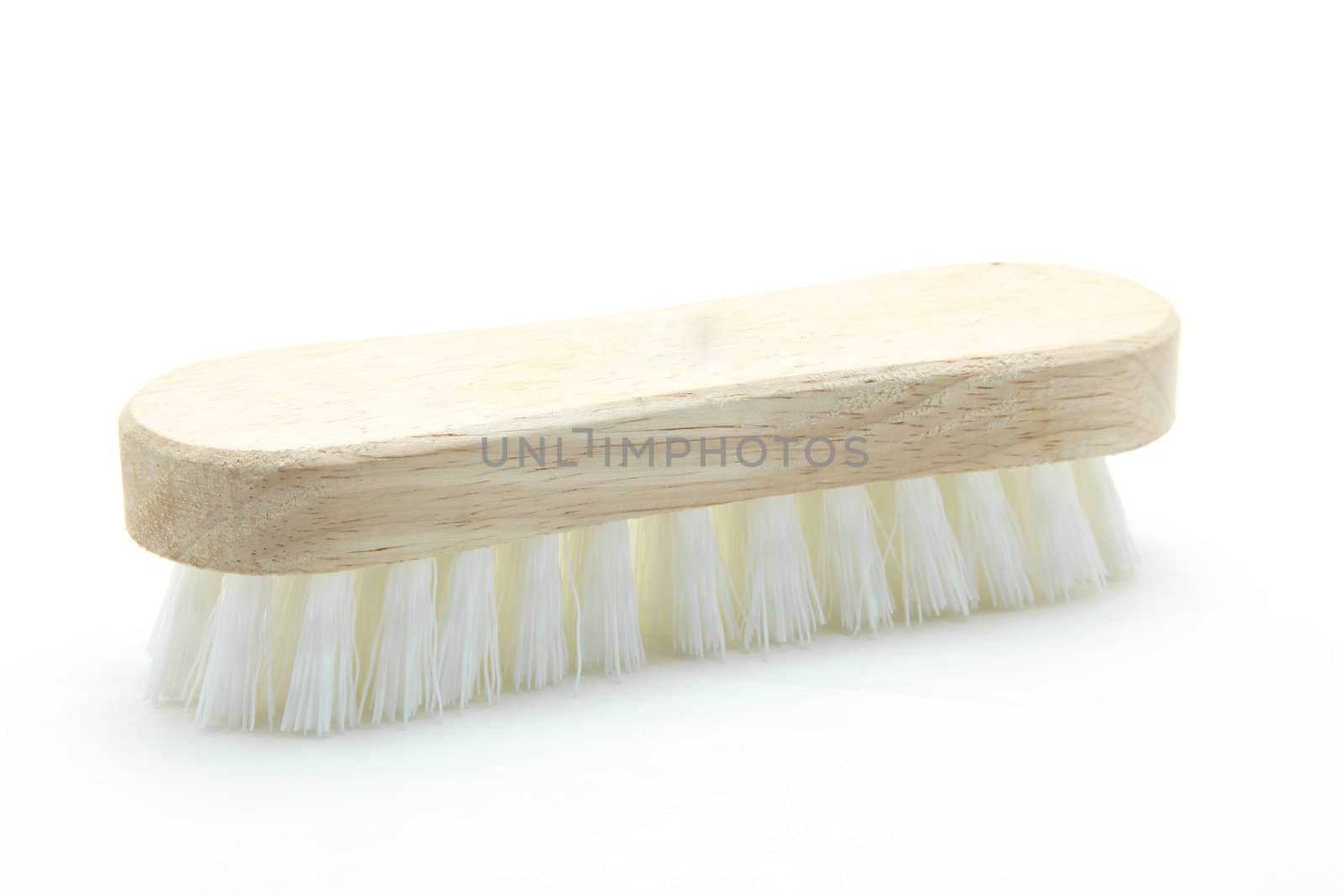 wooden cleaning scrub brush isolated on white background