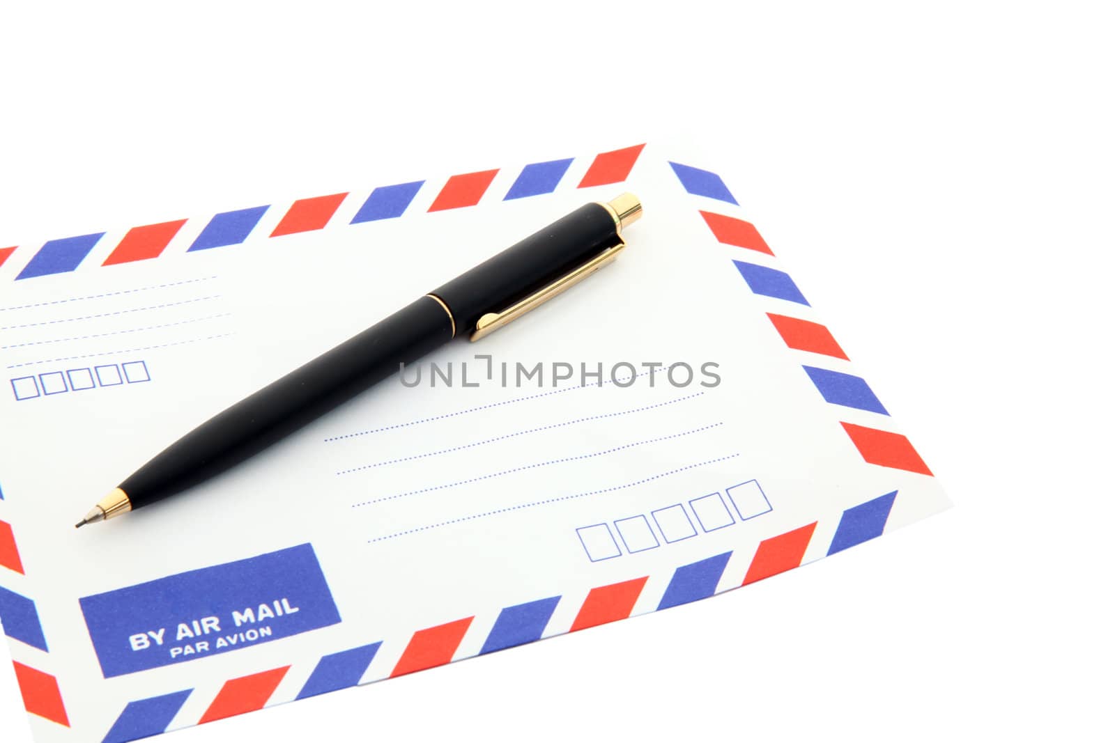 air mail envelope with pen isolated on white background