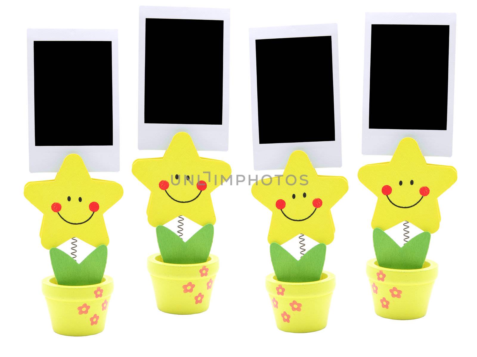 isolated four blank instant photo frame on holder in star shape