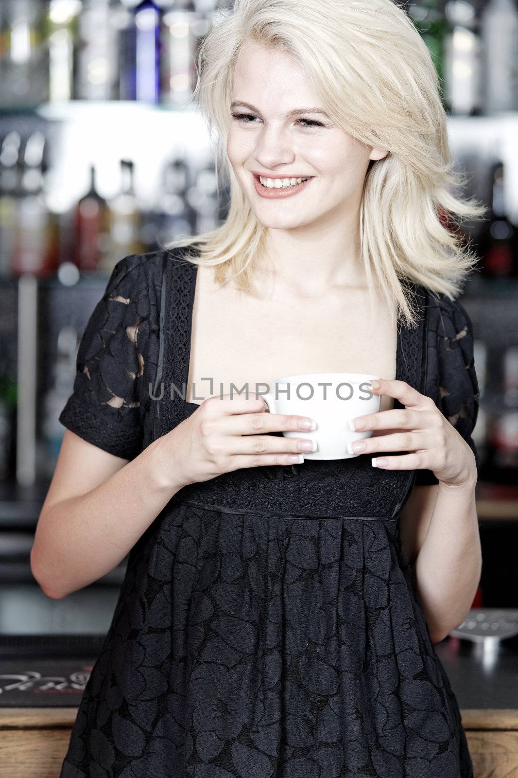 attractive woman waiting for someone at a wine bar.