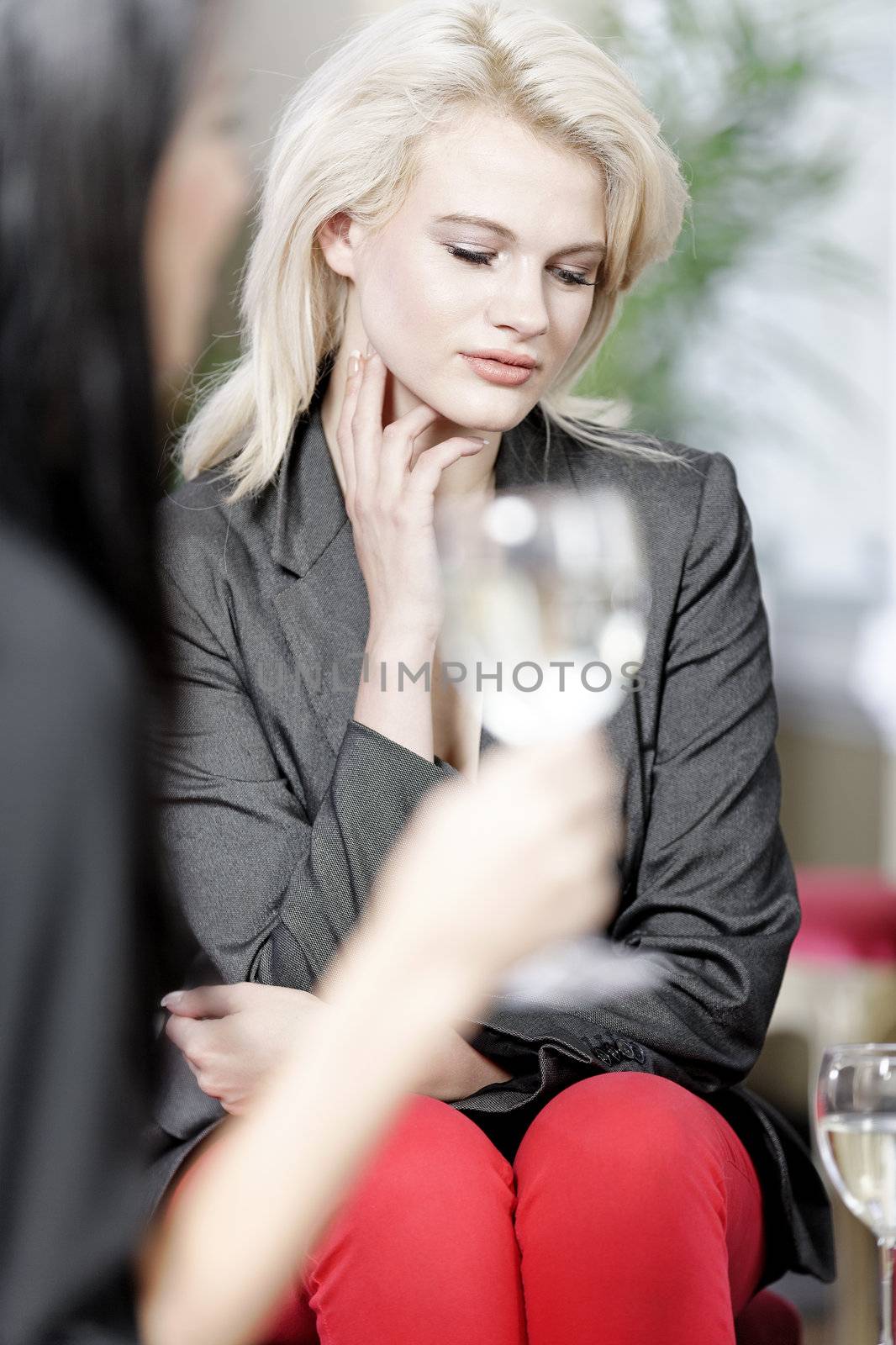 attractive woman waiting for someone at a wine bar.