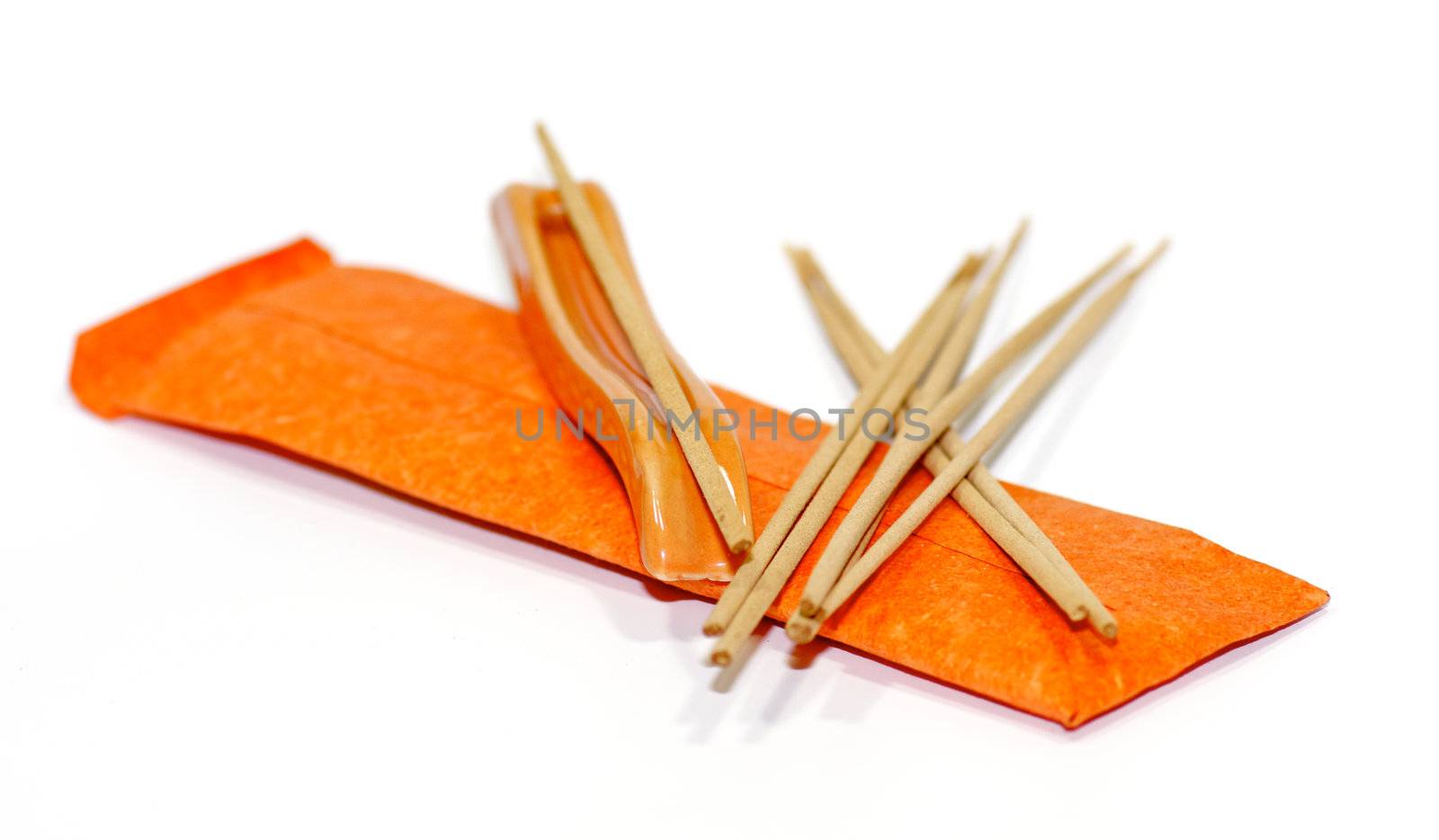 Orange aromatherapy sticks isolated on white background