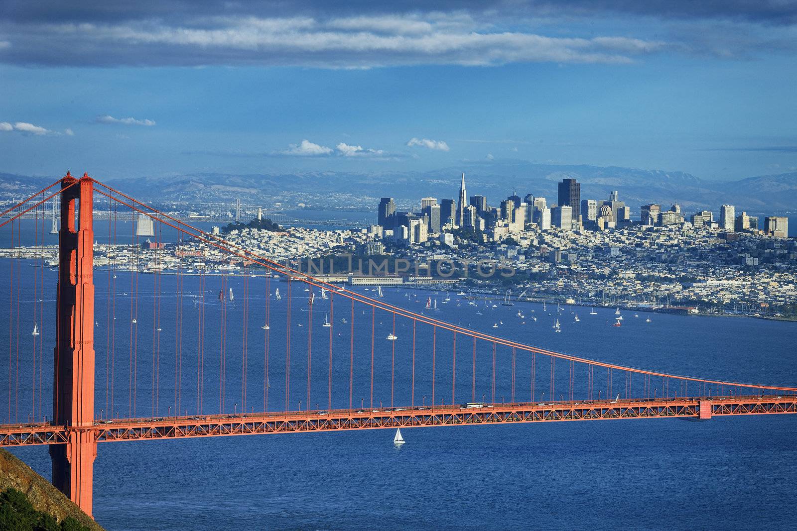 famous view of Golden Gate Bridge and downtown San Francisco 