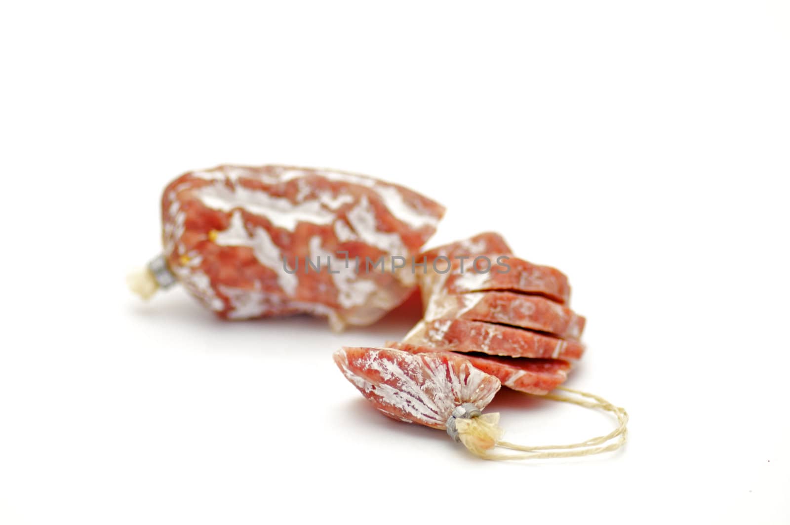 Sliced salami salchichone isolated on white background