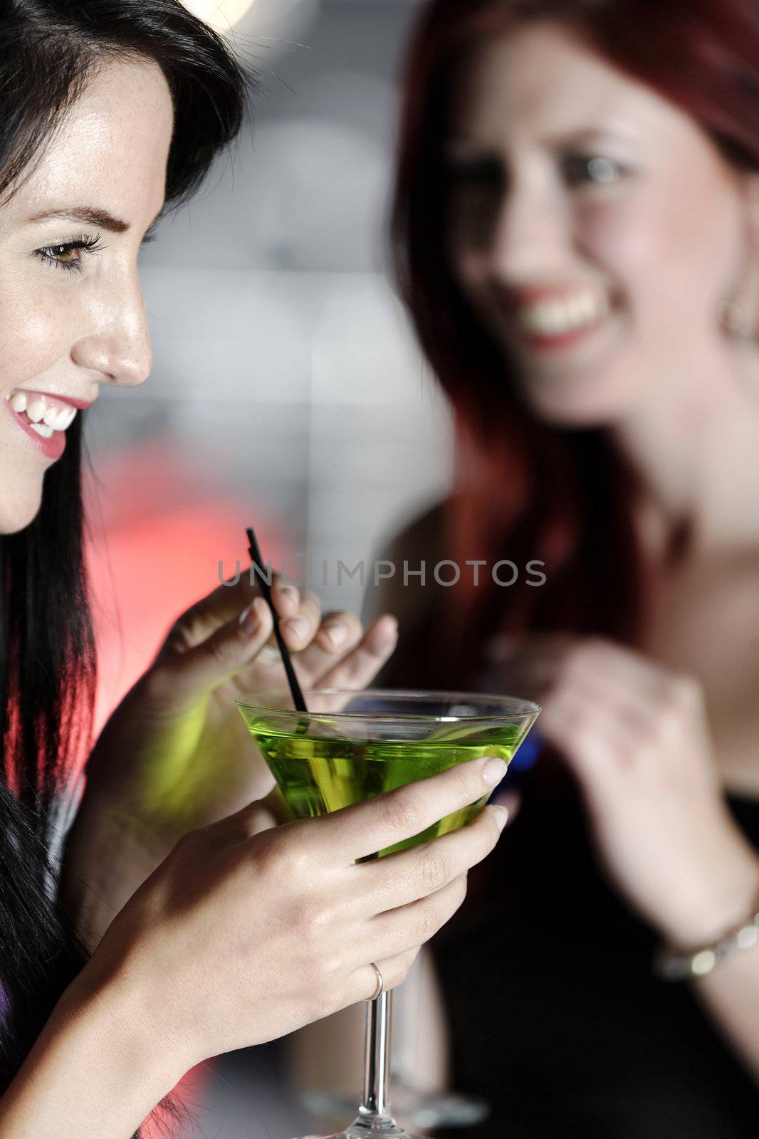 Two friends in a nightclub by studiofi