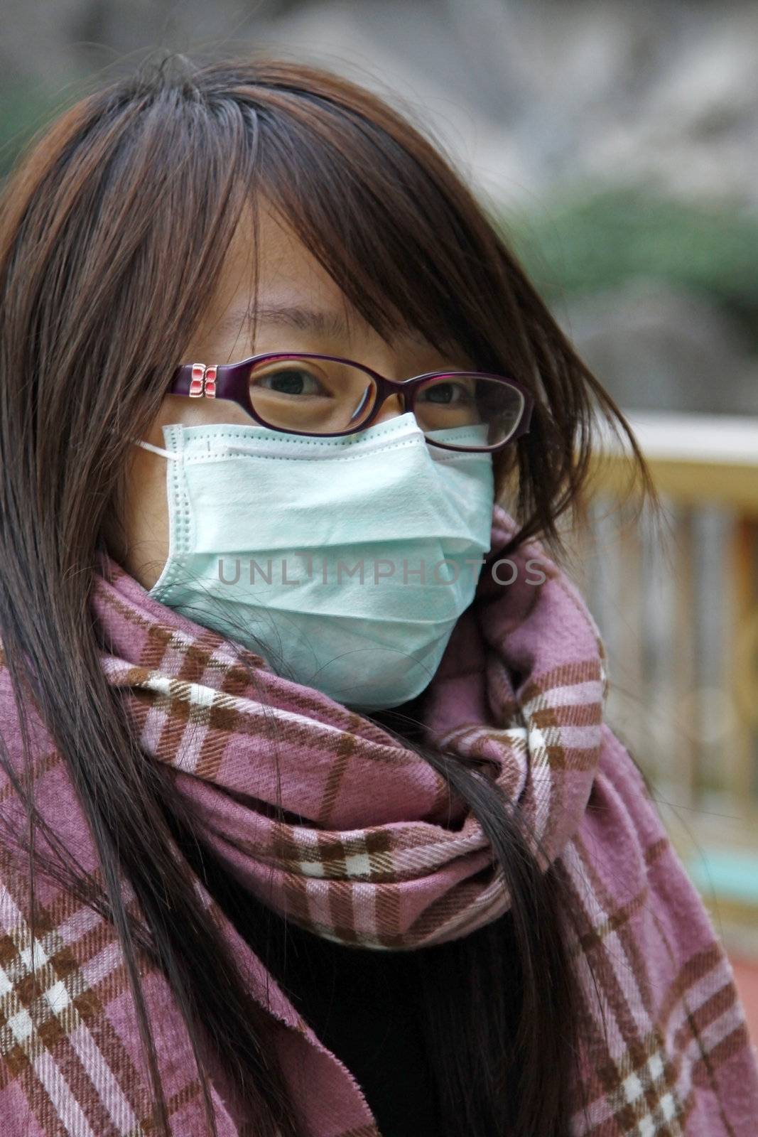 Chinese sick girl wearing mask