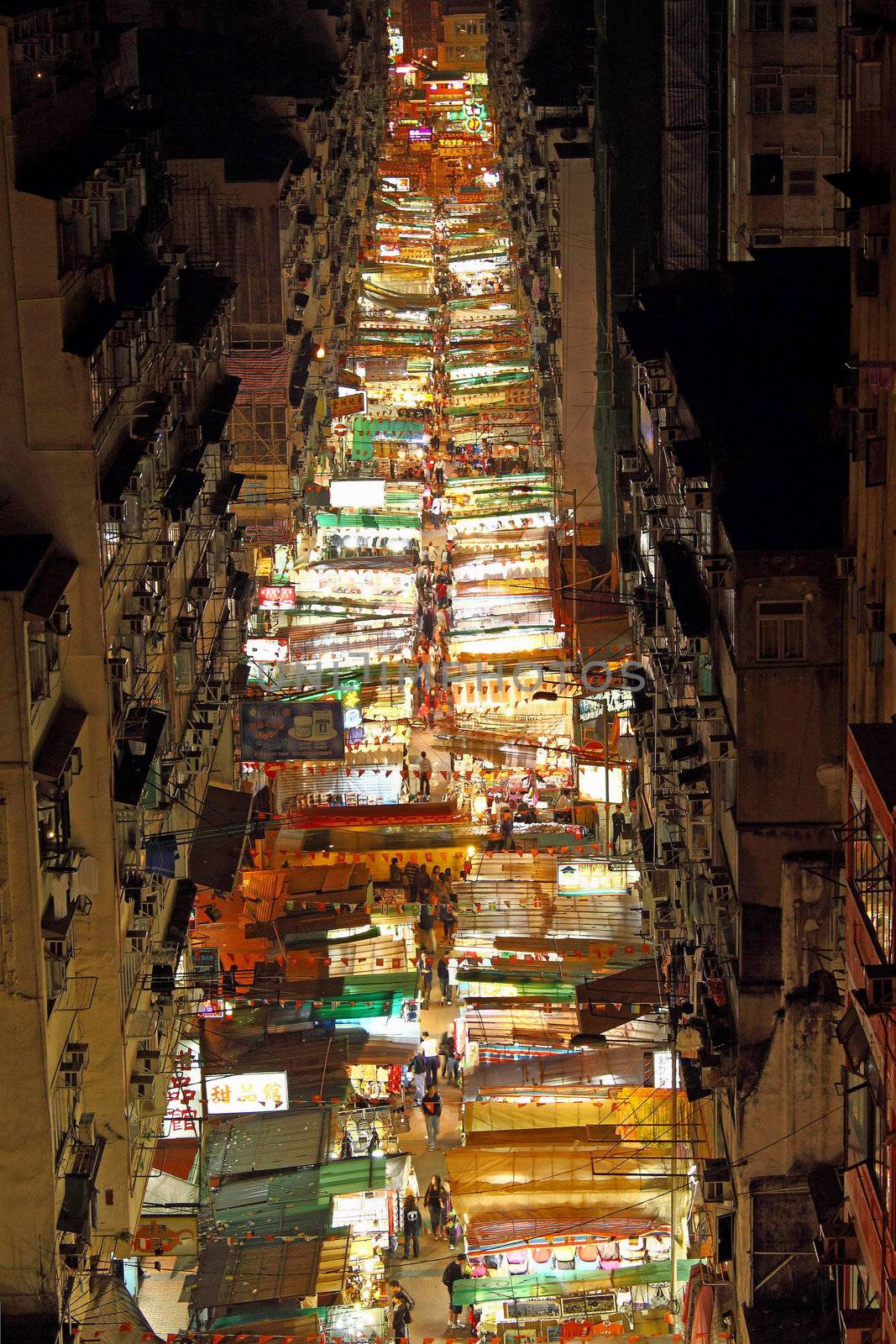 Temple Street with many booths in Hong Kong by kawing921