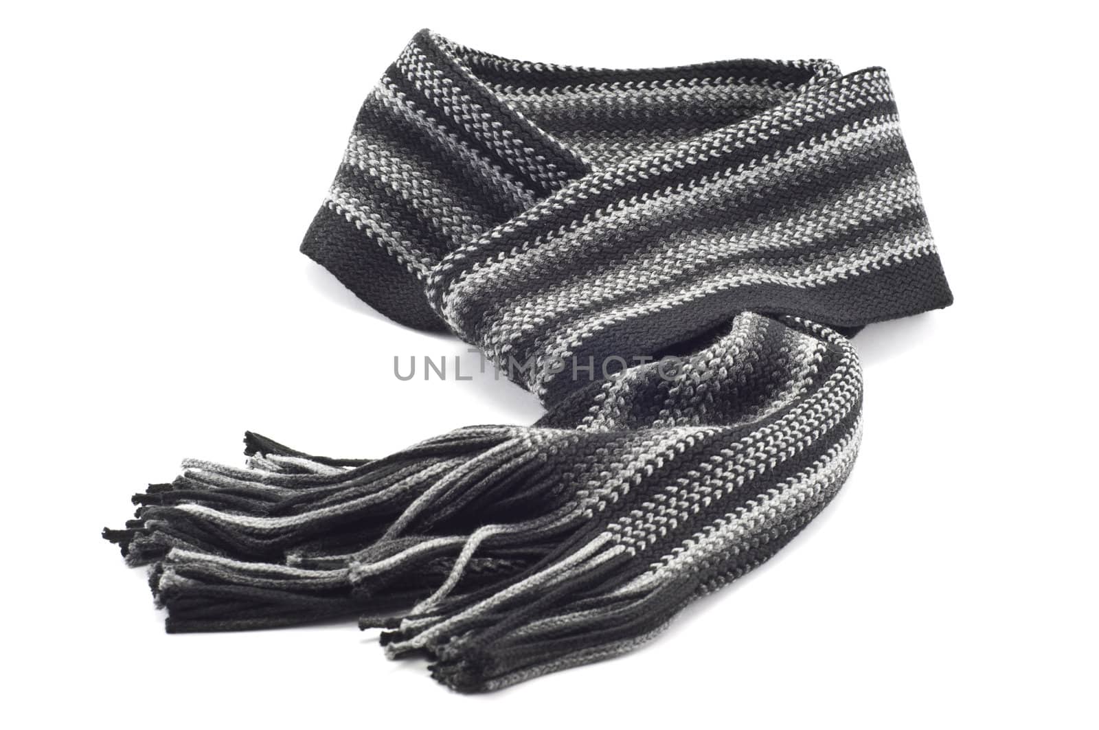 Warm knitted scarf on a white background