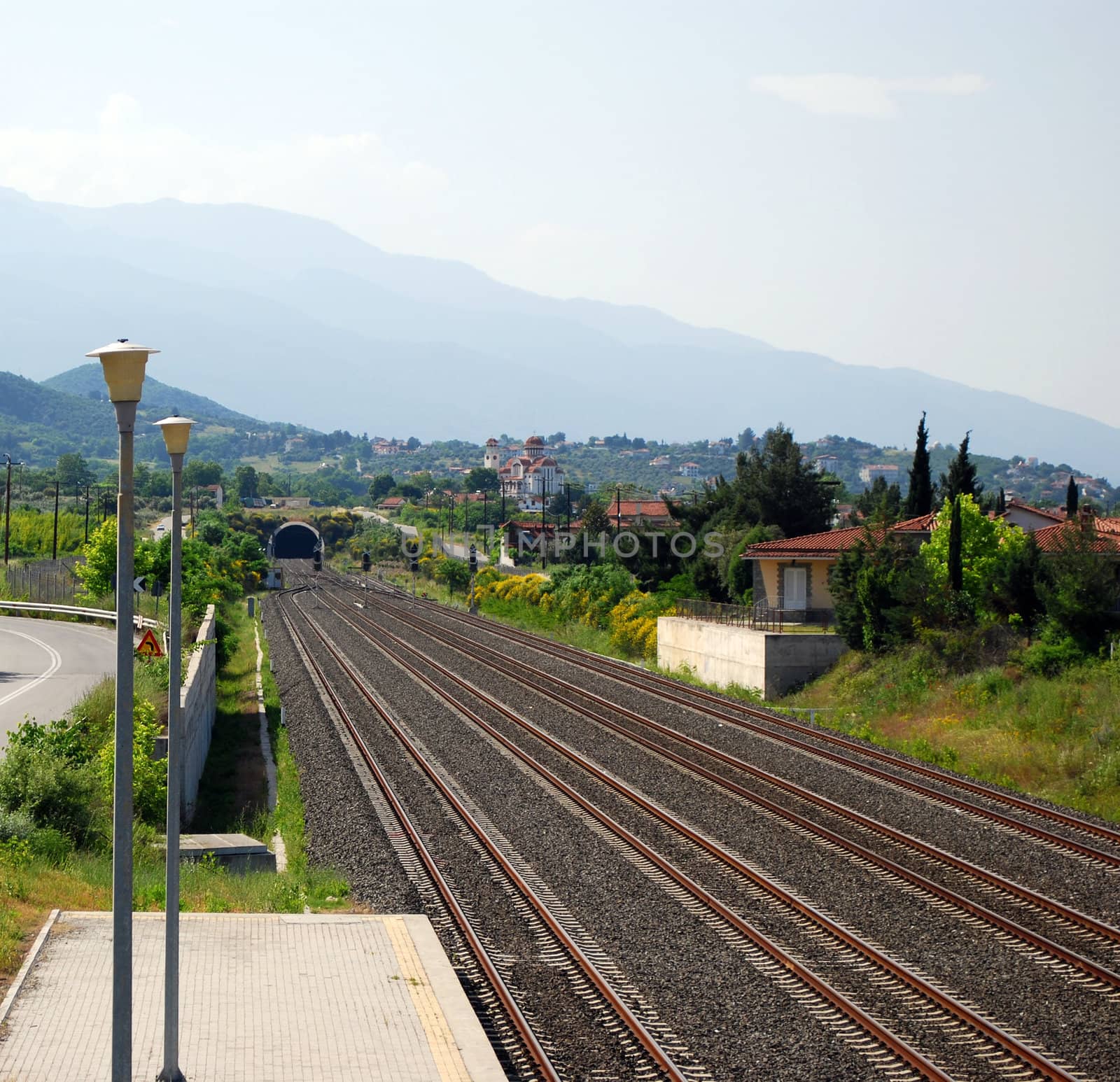 railroad with tunnel and crossroads