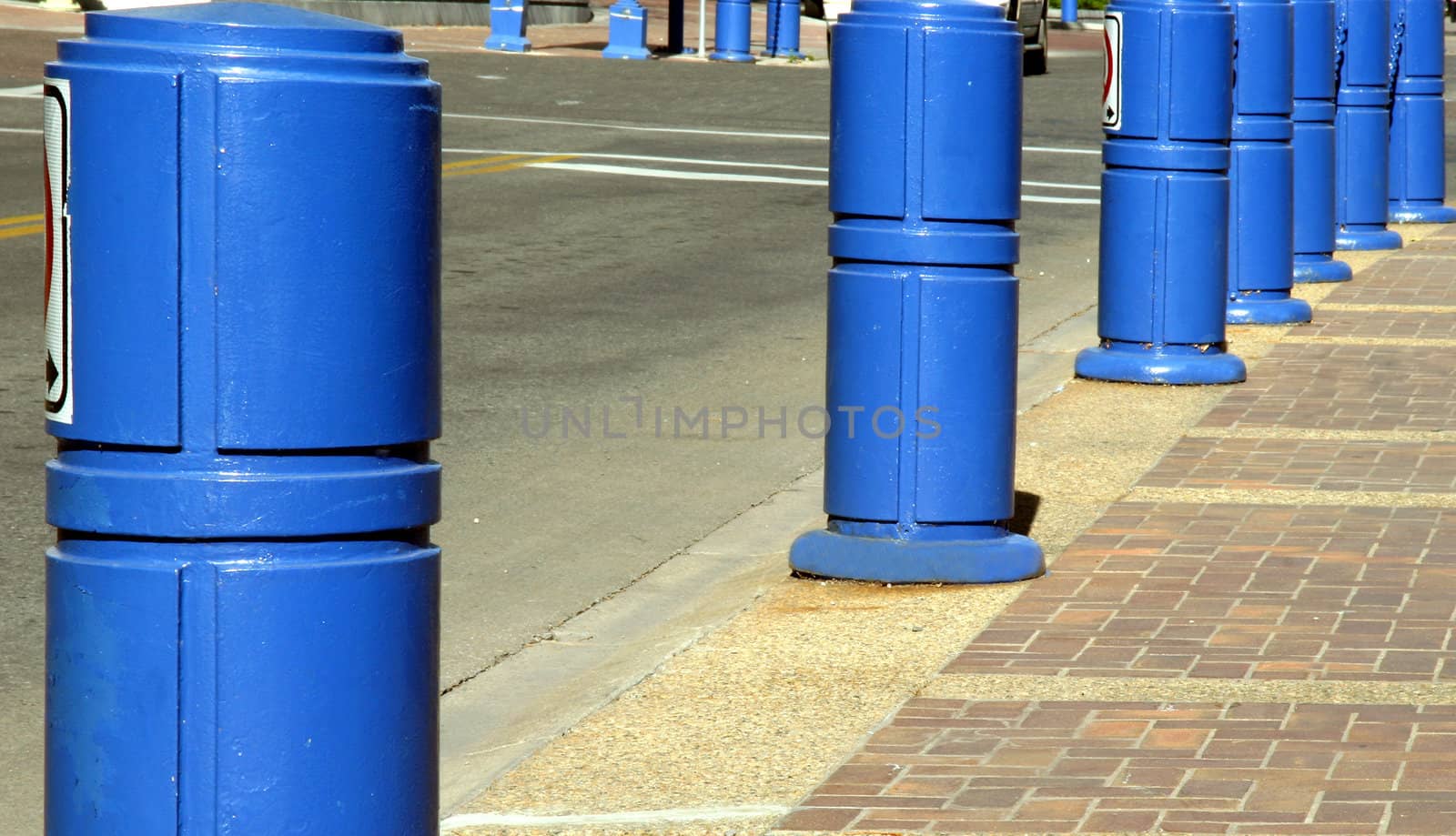 Abstruct  Blue post by the side walk