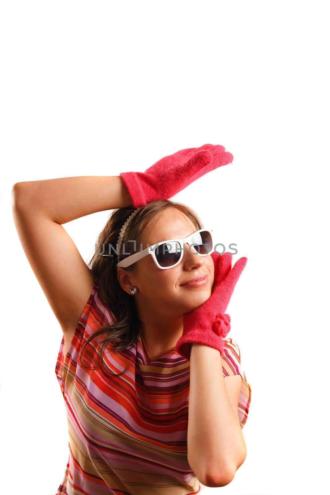 Modern looking young woman wearing sun glasses