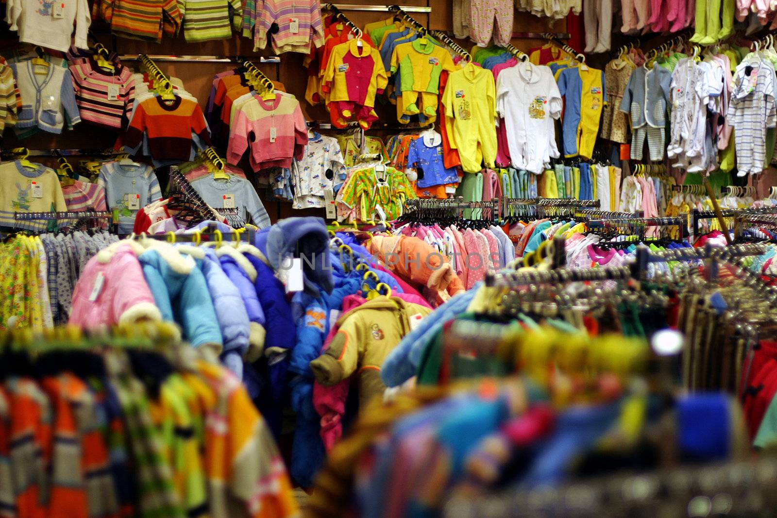 Bright babies clothes department in shop