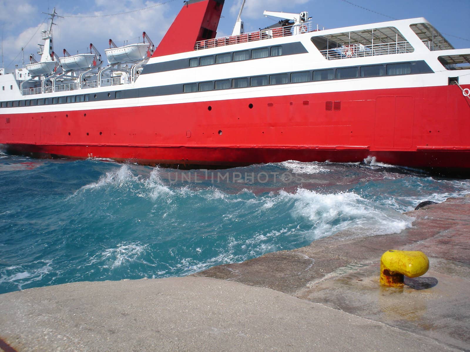 Ship at the pier in windy weather                               