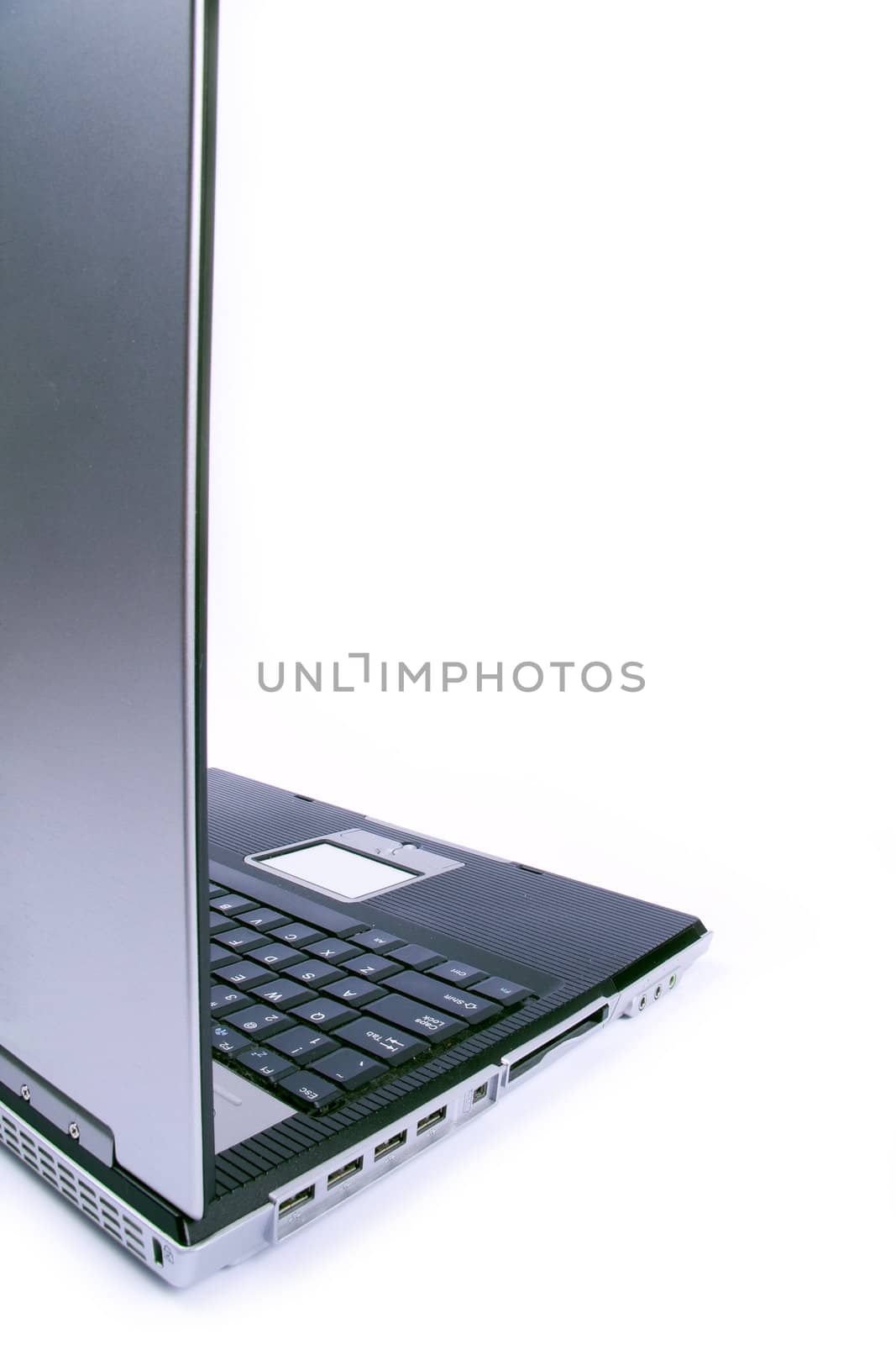 Open laptop from profile isolated on white.