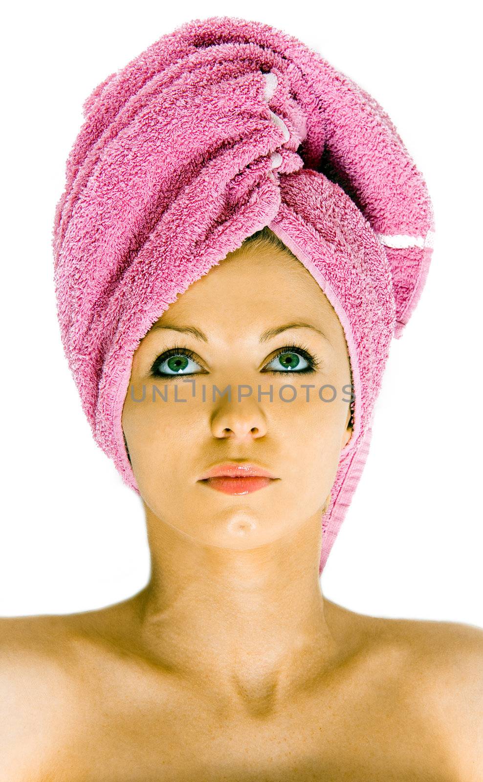 Beautiful woman during the spa treatment isolated on white. Eyes open.