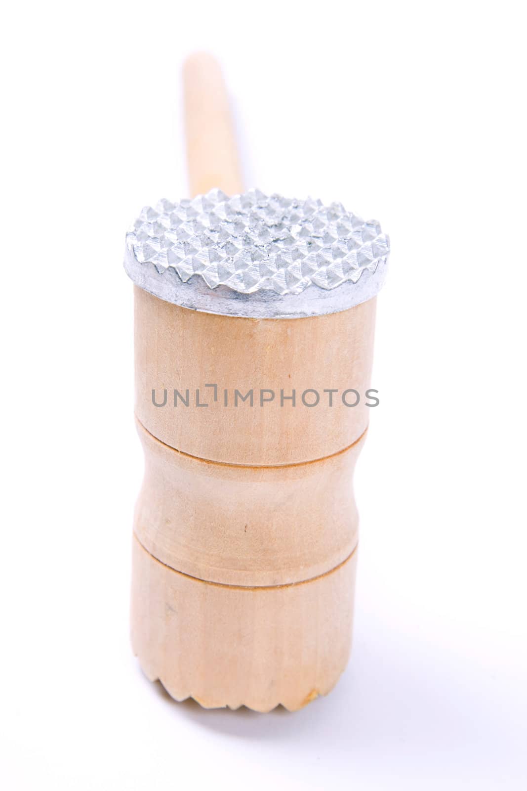 Wooden meat hammer on white background.