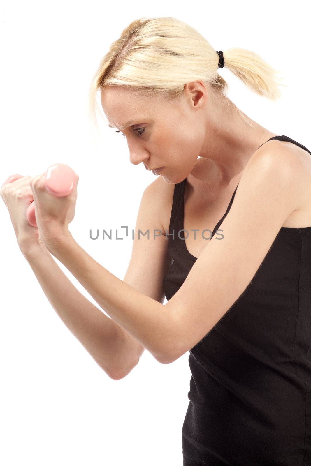Woman training with weights