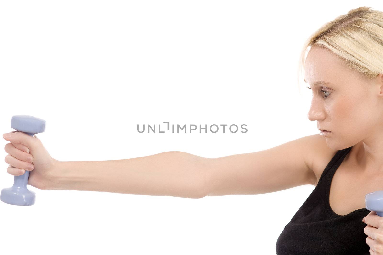 Woman training with weights