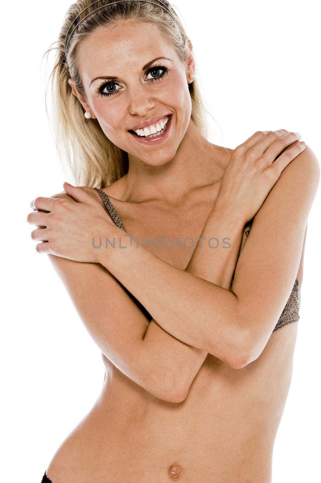 Beautiful young woman in underwear isolated on white background