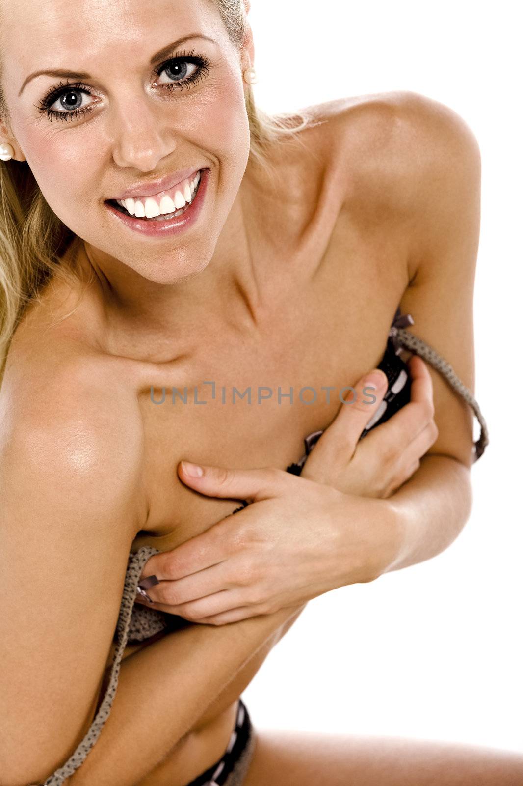 Beautiful young woman in underwear isolated on white background