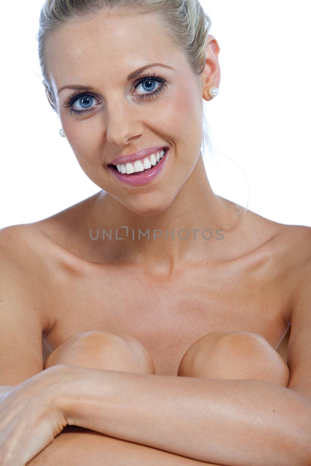 Beautiful young woman in beauty style pose naked on white background