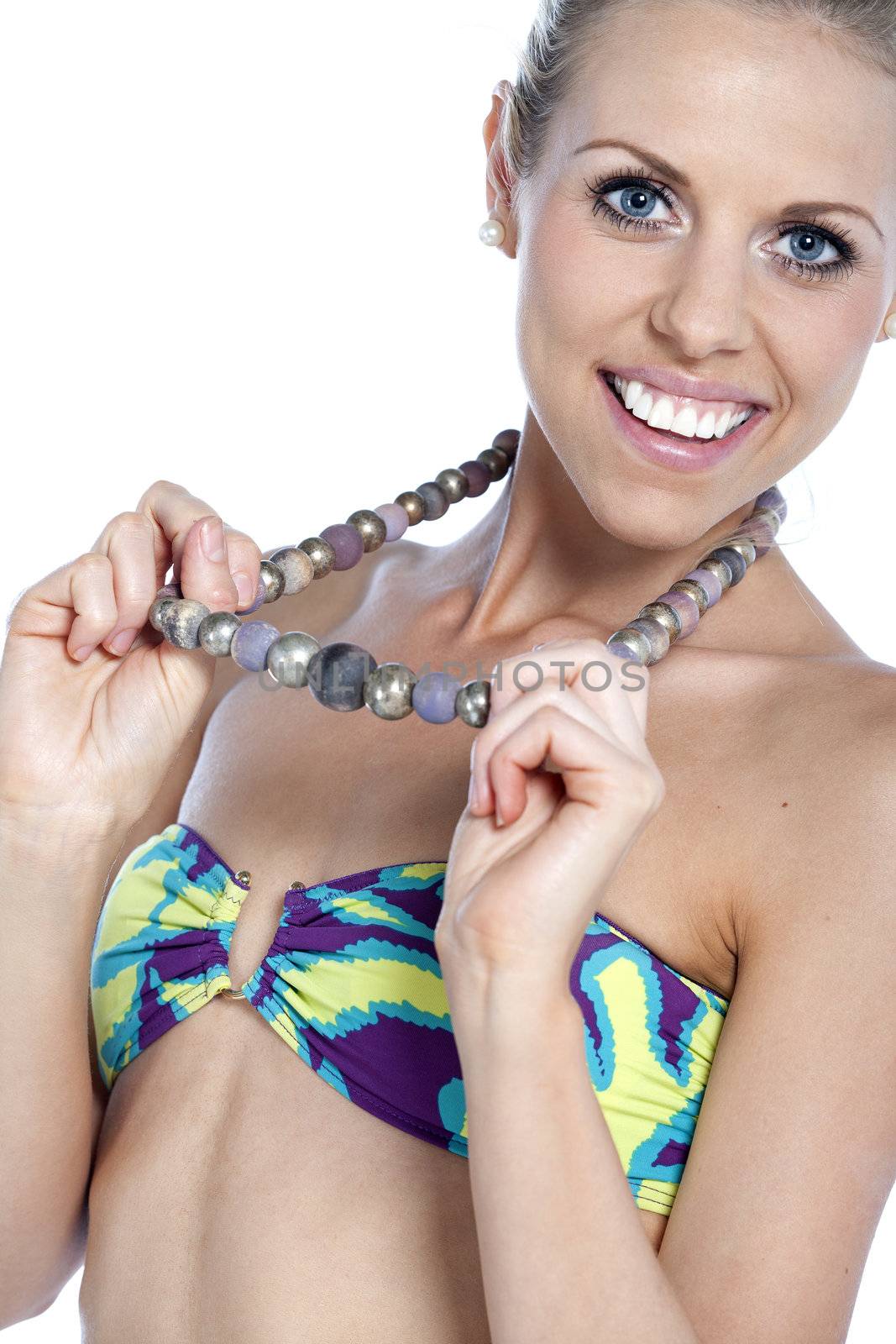 Sexy young woman wearing a bright bikini