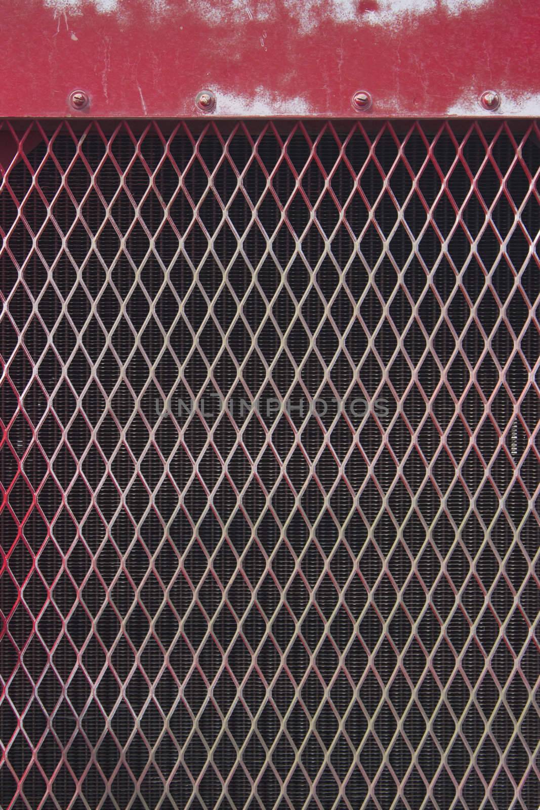 Red metal grate pattern by jeremywhat