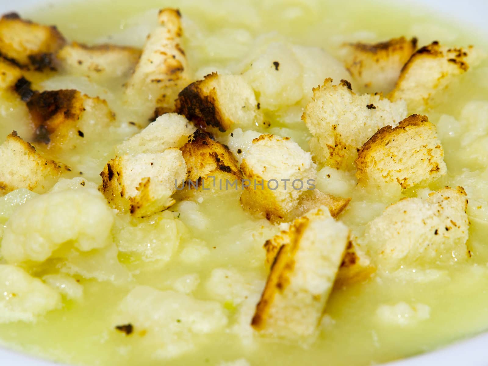 cauliflower soup with peaces of bread