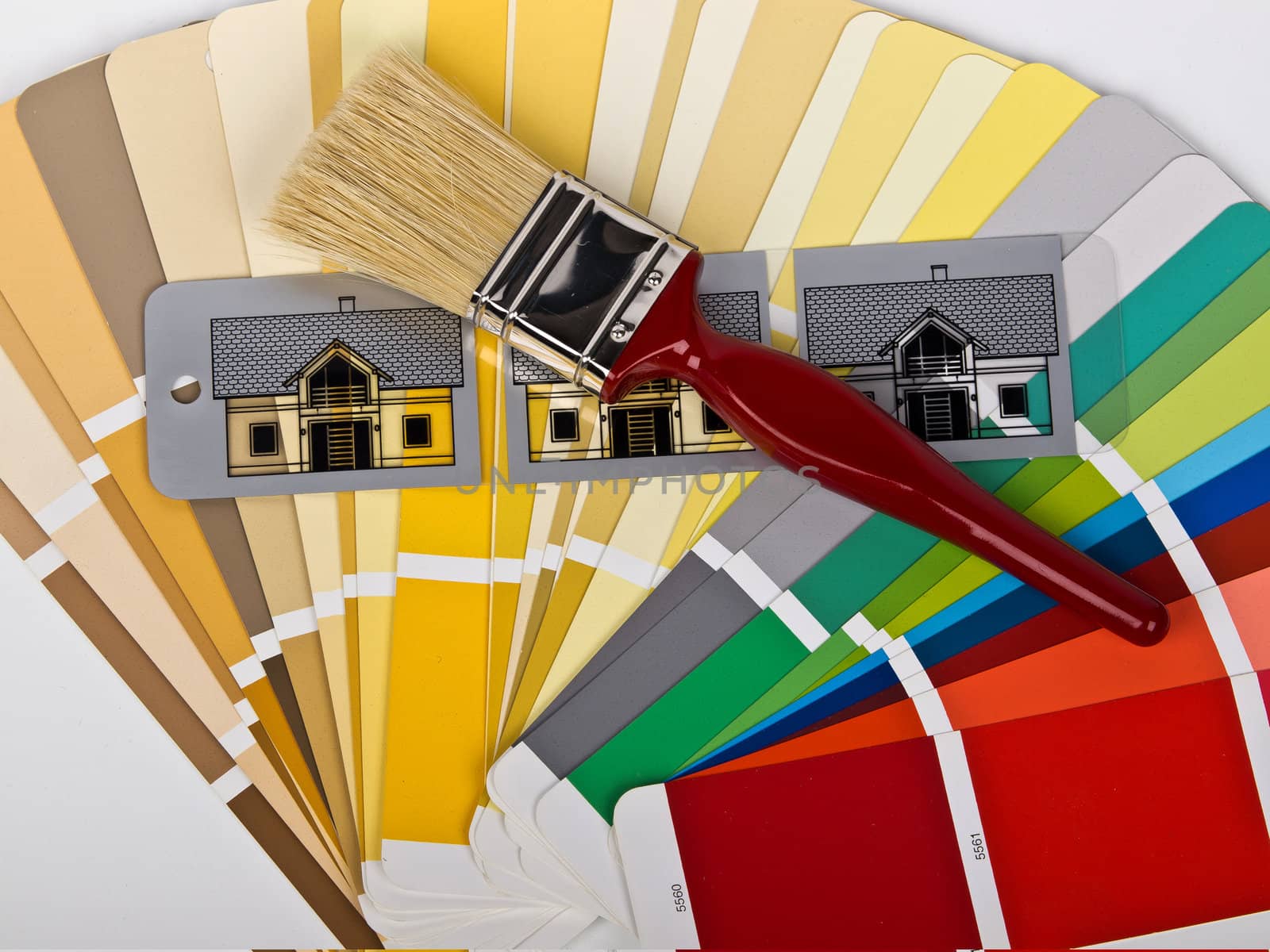 paint brush and houses in diferent colors