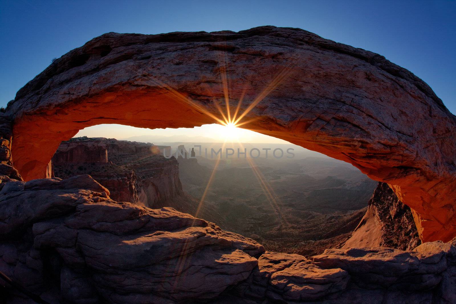 famous Sunrise at Mesa Arch in Canyonlands National Park, Utah, USA 