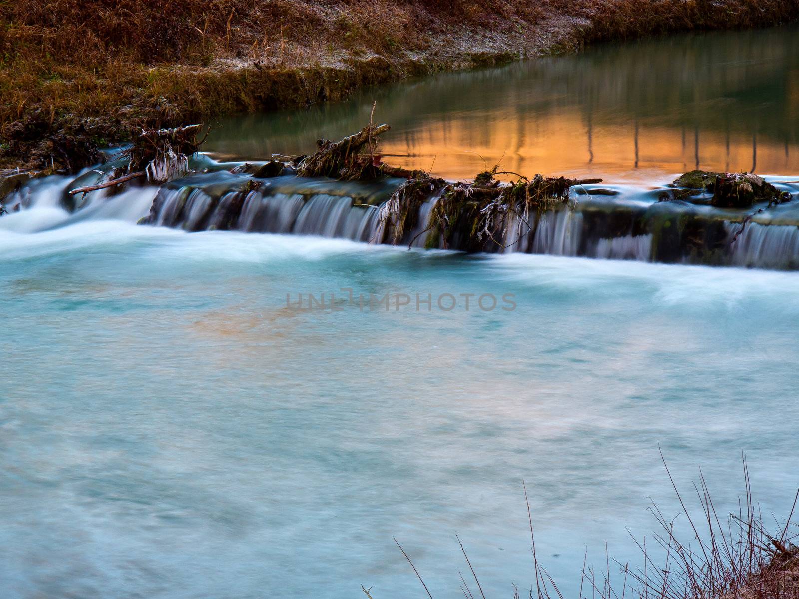 red creek in the cold morning