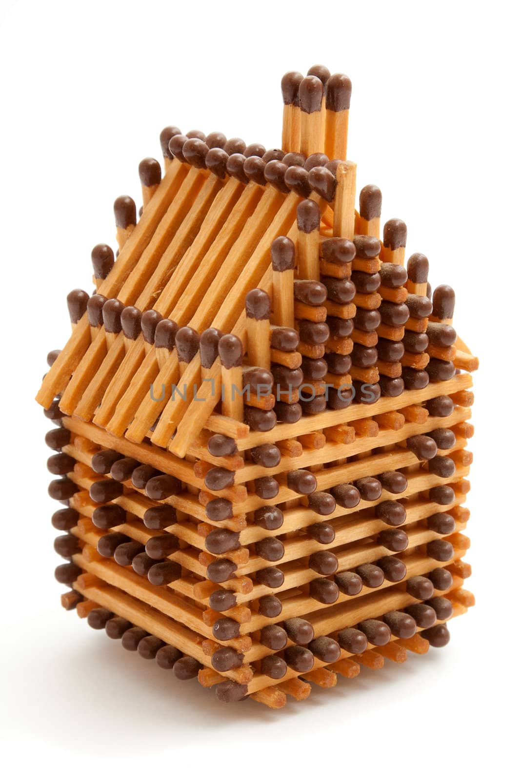 House build from matches on white isolated background