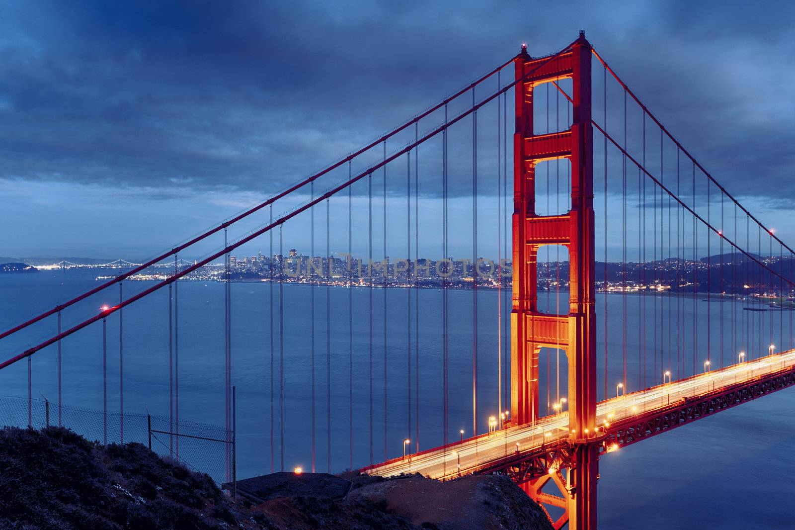 Night scene with famous Golden Gate Bridge and San Francisco lights